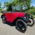 1929 Austin Seven Chummy in Maroon with black interior and black hood.