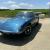 LOTUS Elan +2S 130/4 in Lagoon Blue with Silver Roof.