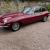 E type Jaguar 1969 2+2, 5 speed manual, triple su, regency red