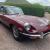 E type Jaguar 1969 2+2, 5 speed manual, triple su, regency red
