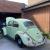 Old Rare green Herbie 1960’s Volkswagen Beetle with one original number plate