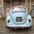  1973 tax exempt blue and white vw beetle 
