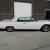LINCOLN CONVERTIBLE SUICIDE DOORS LOW MILES WHITE ON RED