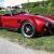 NEW 1965 BACKDRAFT ROADSTER FORD COYOTE T5 5 Speed CHRYSTAL RED  Gray Stripes