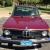 1975 2002  Burgundy BMW  with tan interior.