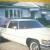 1976 Coupe Deville Cadillac White/Red Vinyl half top