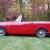 1967 Sunbeam Alpine Red with black interior. Wire wheels. Good driving example