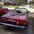 1978 Mercedes 450 SL Convertible Roadster / jump seat. Euro lights, maroon.