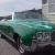 trophy winner candy apple green Olds 98 conv.  with pinstripping and silver leaf