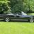 1964 Pontiac Bonneville triple black convertible with American Racing Wheels