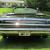 1964 Pontiac Bonneville triple black convertible with American Racing Wheels
