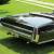 1964 Pontiac Bonneville triple black convertible with American Racing Wheels