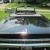 1964 Pontiac Bonneville triple black convertible with American Racing Wheels