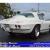 Numbers Matching 327 ci V8 350 hp 4 speed manual Vette coupe factory air con
