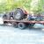 GMC High Sierra 6500 rollback truck with big block Chevrolet engine