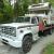 GMC High Sierra 6500 rollback truck with big block Chevrolet engine