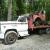 GMC High Sierra 6500 rollback truck with big block Chevrolet engine
