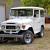 Toyota Land Cruiser FJ40 original Cygnus White chrome wheels