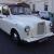 London Wedding Taxi. Roll Top Convertible. White, Fairway. Nissan Engine. Auto.