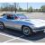 1965 Chevrolet Corvette Coupe, 396/425 HP Gray/Red w/ shipping data report.