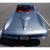 1965 Chevrolet Corvette Coupe, 396/425 HP Gray/Red w/ shipping data report.