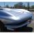 1965 Chevrolet Corvette Coupe, 396/425 HP Gray/Red w/ shipping data report.