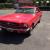 Ford Mustang 1965 Notchback in Candy Red with correct Cream interior