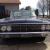 4 door, deep blue looks black, new interior and paint