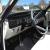 4 door, deep blue looks black, new interior and paint