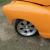 This is an orange 1955 Chevy, that needs a few more minor details put into it.