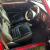 ROVER MINI COOPER 1999. WITH 12MTHS MOT. IN RED/WHITE.