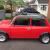 1990 Classic Rover Mini Mayfair, 998cc. Red with a black roof.