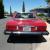 red with tan interior, both tops, excellent condition!