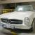 Very rare 230SL in very good condition. Four speed, white exterior, NO rust!