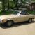 1982 Gold 2-Door 280 SL with six cylinder five speed manual trans. - very rare